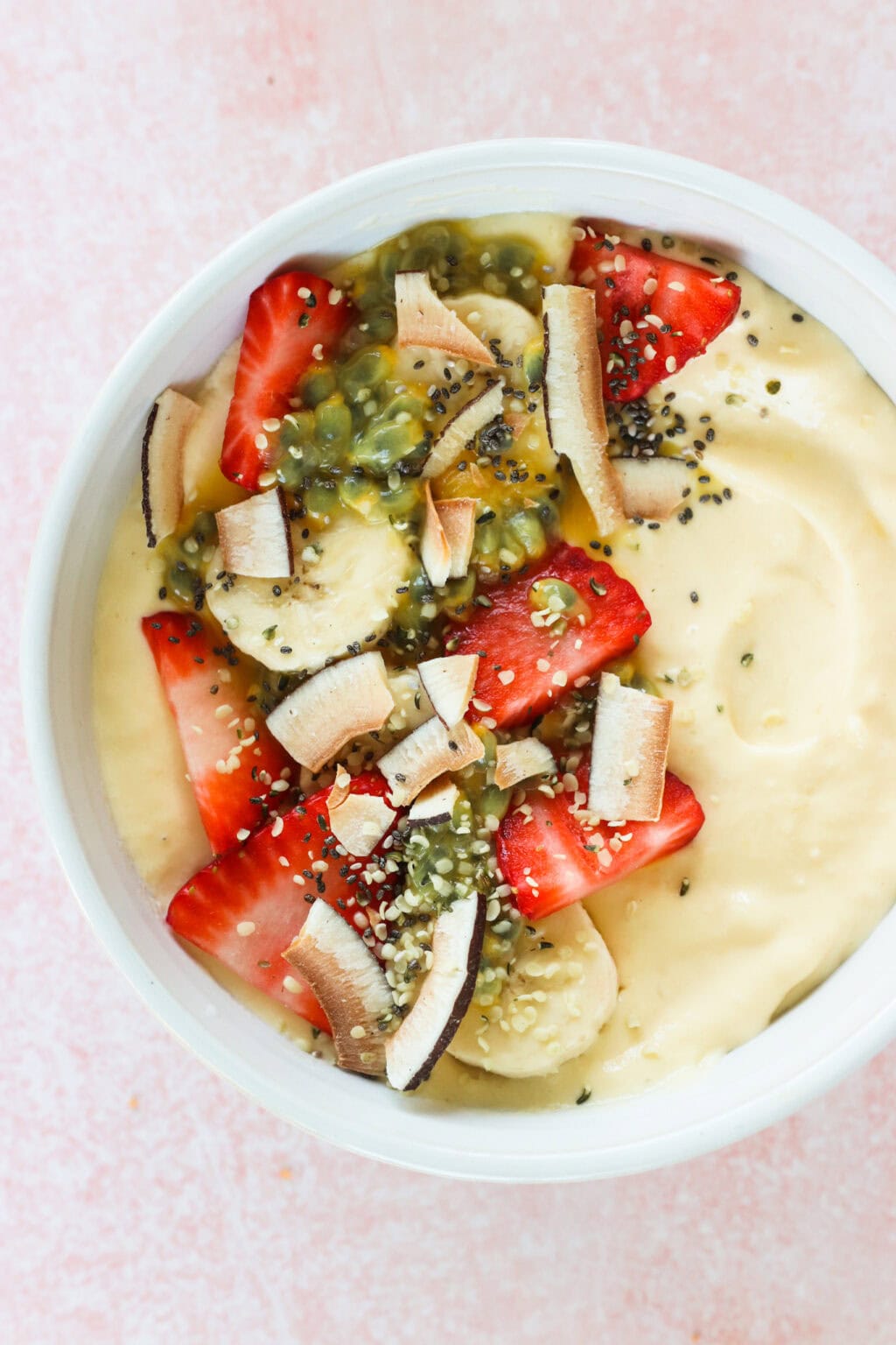 High Protein Tropical Smoothie Bowl with Greek Yogurt in a white bowl
